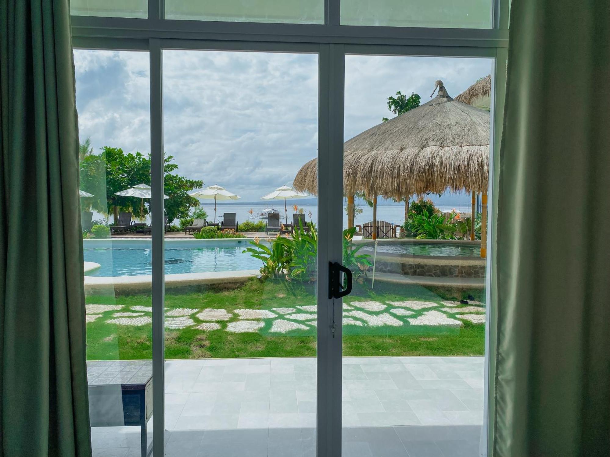 Avila'S Horizon Dive Resort Santander Exterior foto